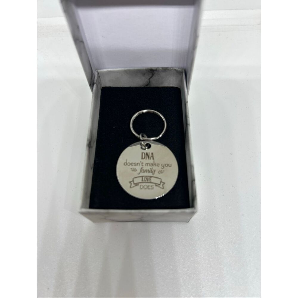 DNA Doesn’t Make You Family Keychain Inspirational Love Gift